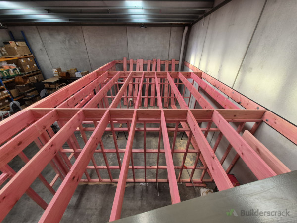 Timber framing structure for mezzanine floor inside existing warehouse.