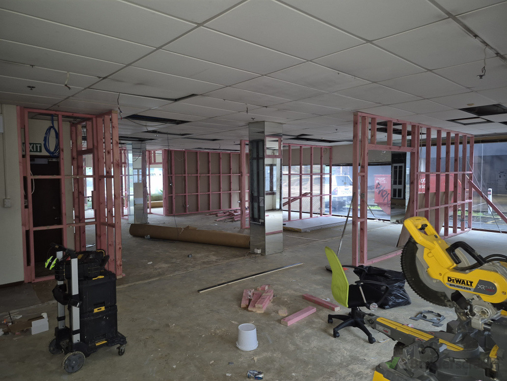 Timber framing layout for new internal rooms during commercial interior renovation.