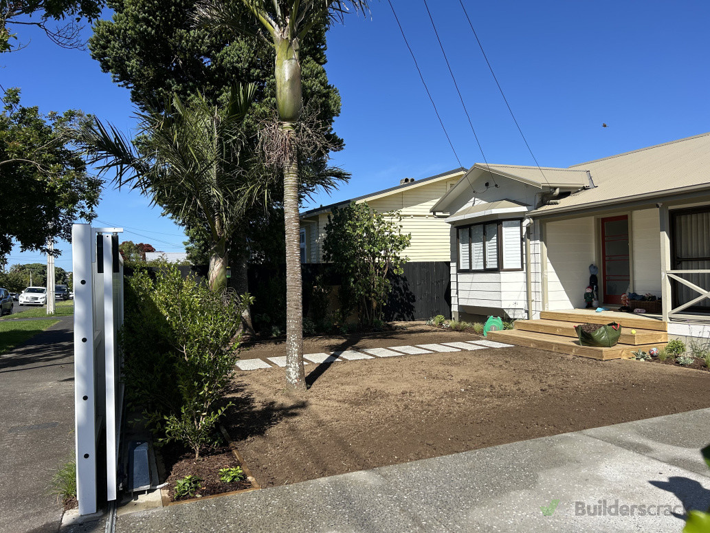 Exposed pebble driveway and steppers / gardens