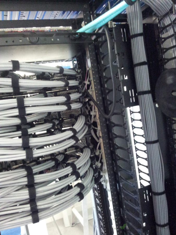 Clean structured cabling installation with organised patch panels and cable management for reliable network performance