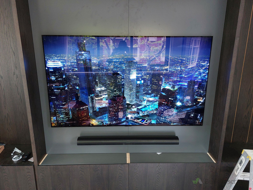 Recessed TV installation with soundbar for a clean, modern home entertainment setup
