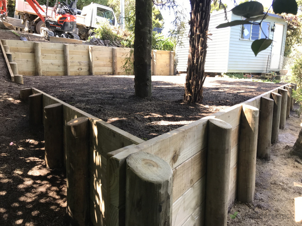 2 retaining walls needed to level out a usable area for this property in Titirangi