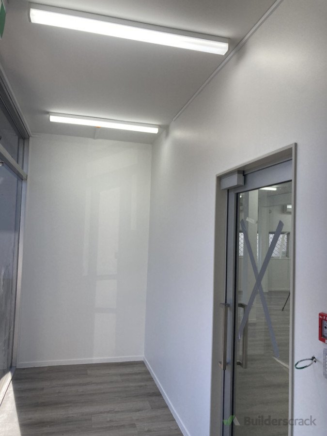 Small business renovation. L shape partition to create lobby area