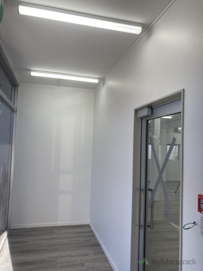 Small business renovation. L shape partition to create lobby area