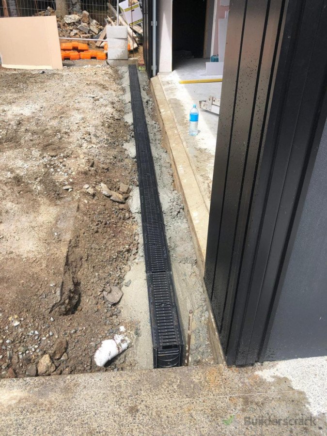 channel drain install with inline sump