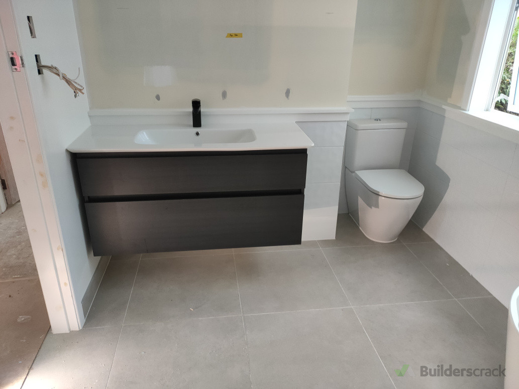 New toilet and vanity installation