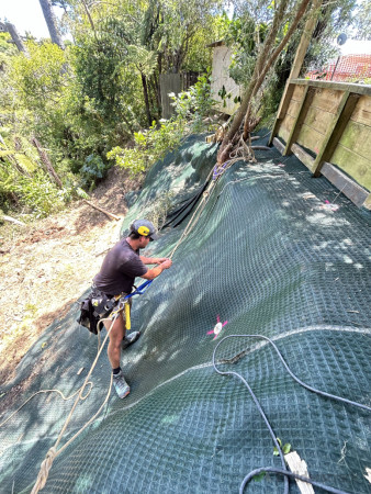 Installation of reinforced matting & driven anchors