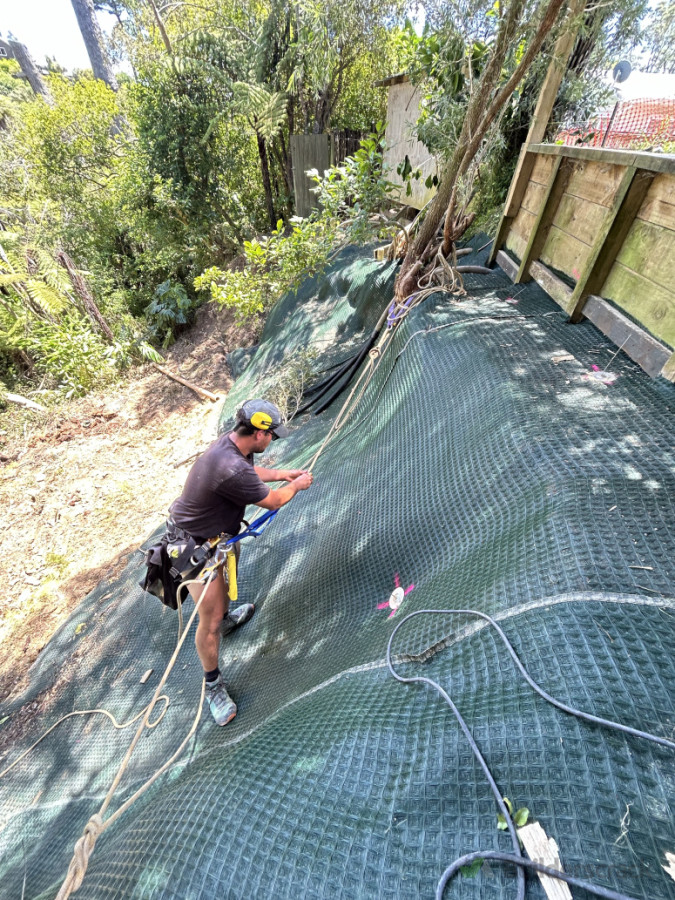 Installation of reinforced matting & driven anchors