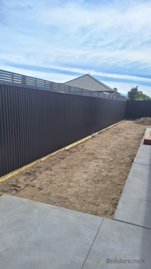 Corroguated iron Fence with topper