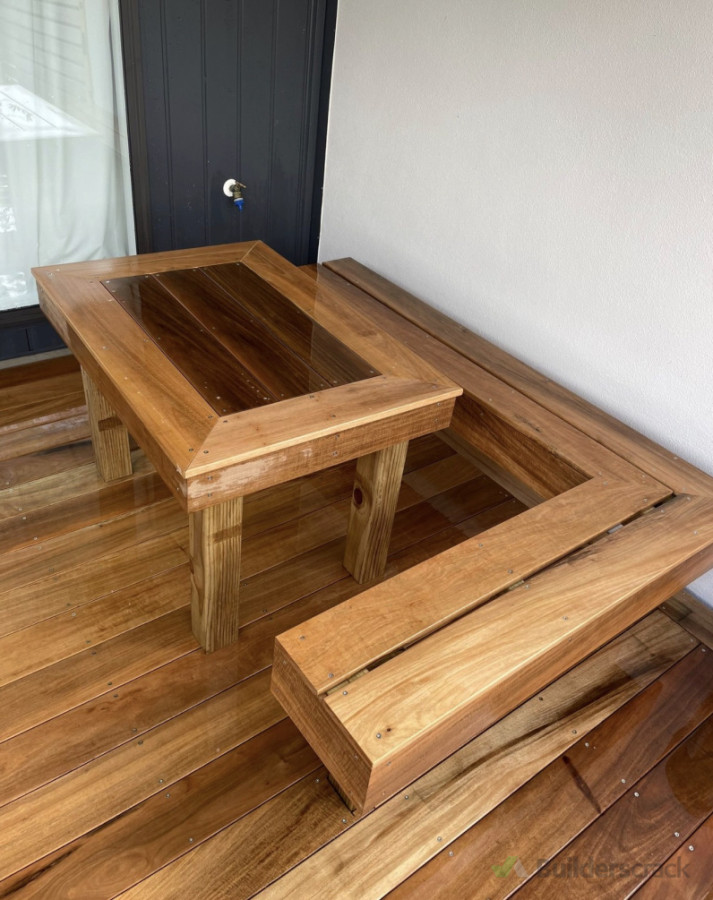 Timber decking including table and seat.