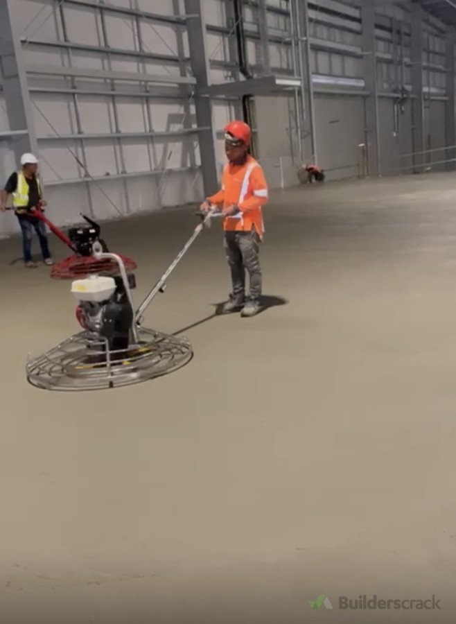 Concrete slab placing and finishing