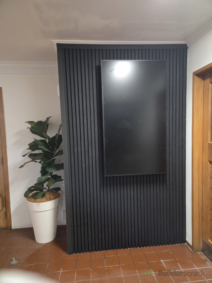 Install accoustic panel behind t.v screen