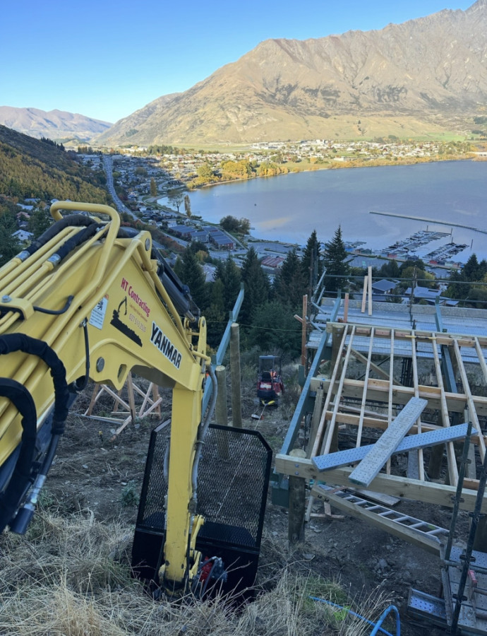 Our winch helping steep trenching on tight sites