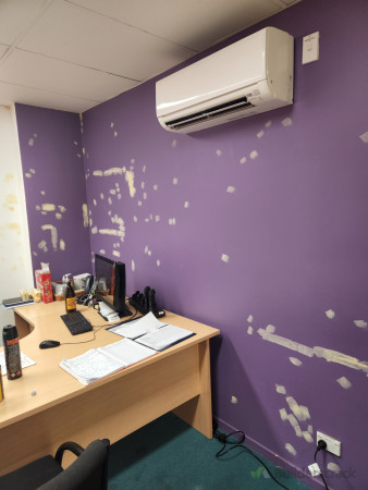 Before - Main office - Another feature wall in the main office