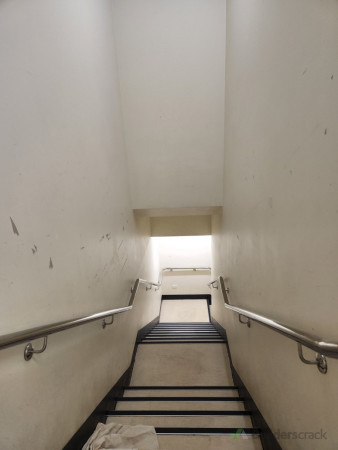 Before - Stairwell - holes filled and sanded ready for repaint