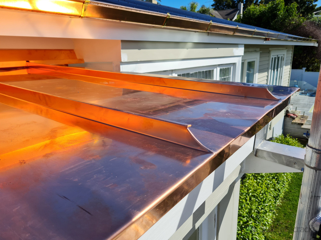 Custom copper roofing detail crafted with precision, creating a refined, high-end finish that will age beautifully over time.