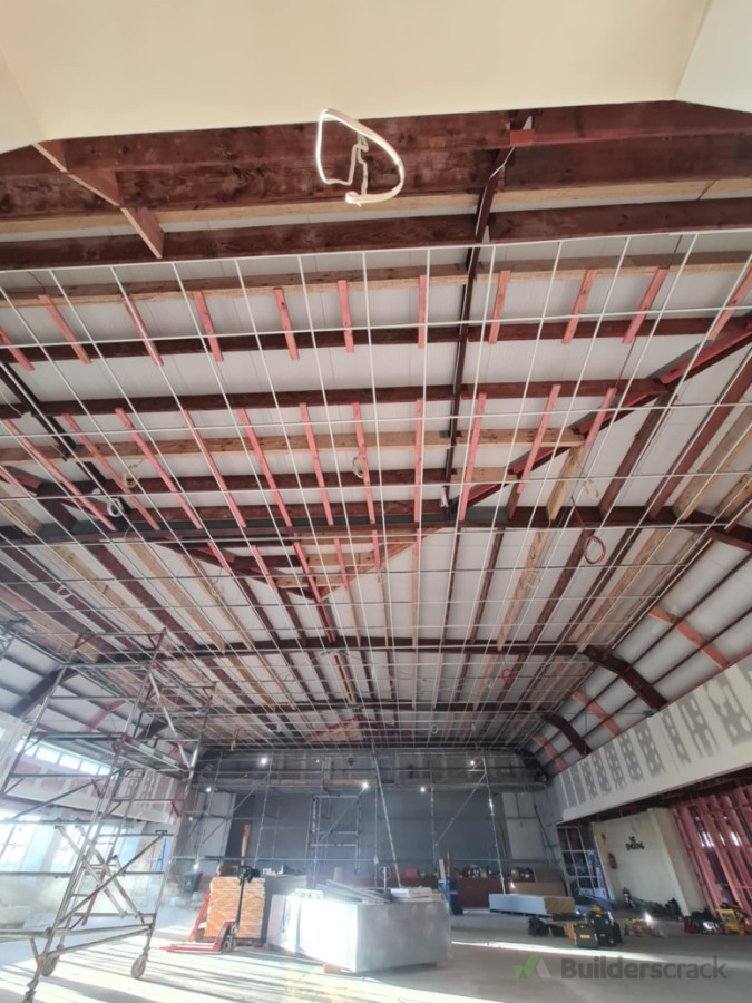 Grid and tile ceiling with a floating perimeter rake in Avondale, Aukland.