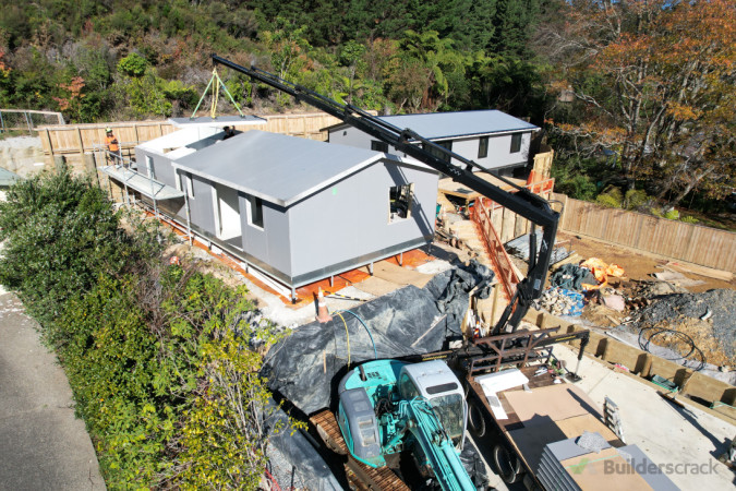 Hiab lifting panels up for us to instal roofing on the 2nd of 3 kits etc homes we built