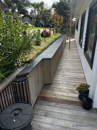 Closed in retaining wall, deck