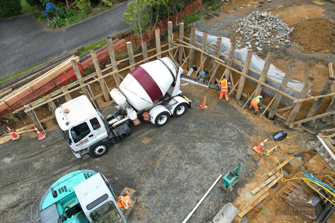 Concreting retaining poles in