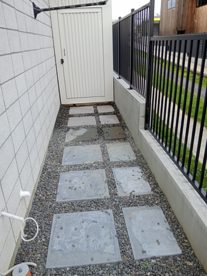 Paver install and pebble fill.