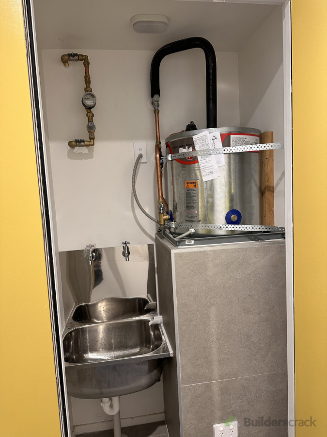 cleaners sink and hotwater unit