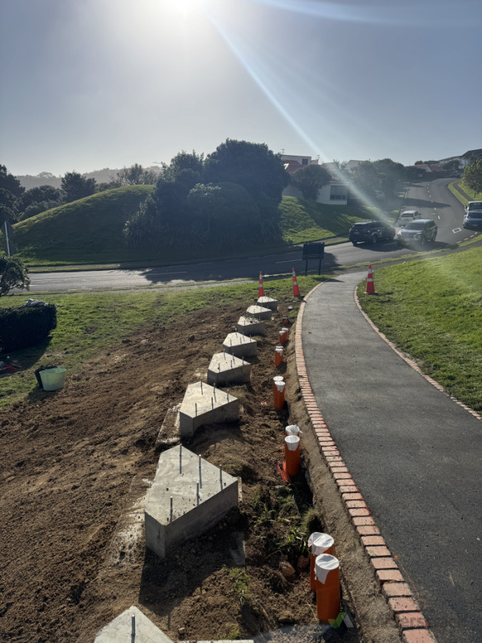 Police College, installing concrete foundations for memorial signage recognising and honouring fallen police officers and service dogs.