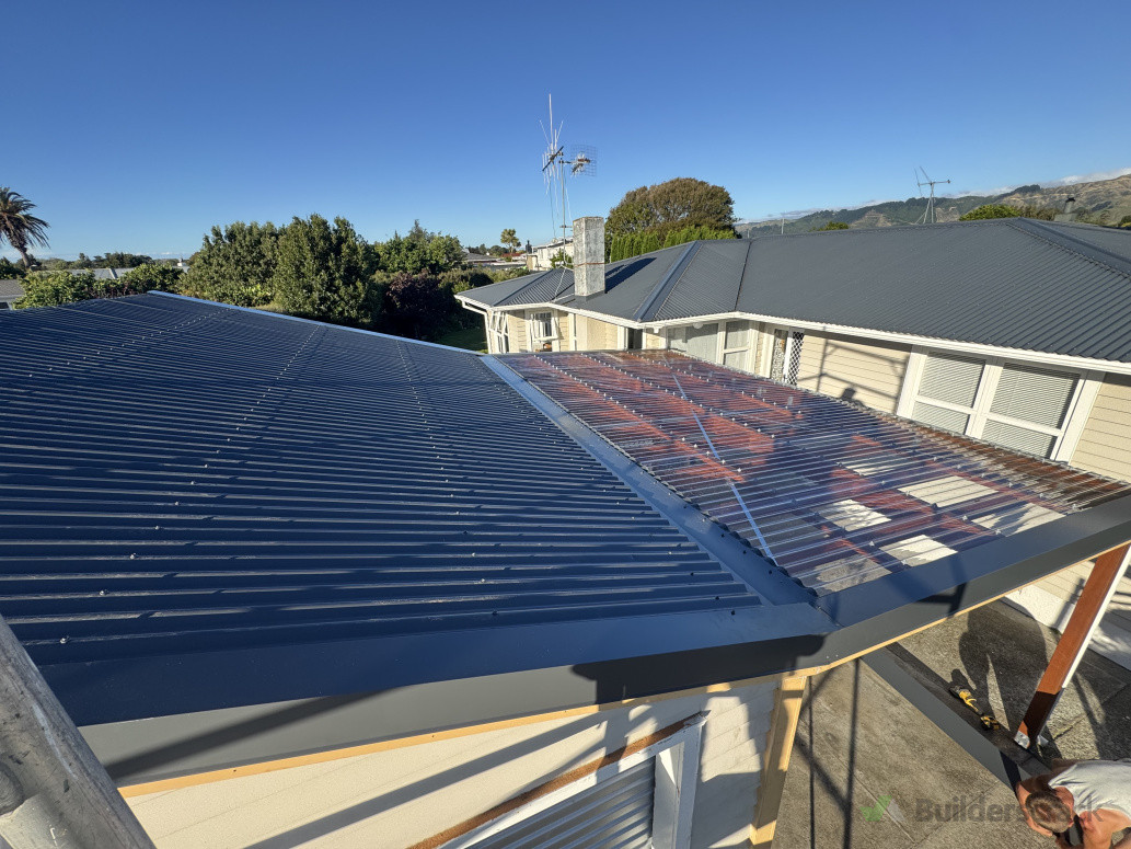 New colour steel roofing, lapped onto clear light roofing