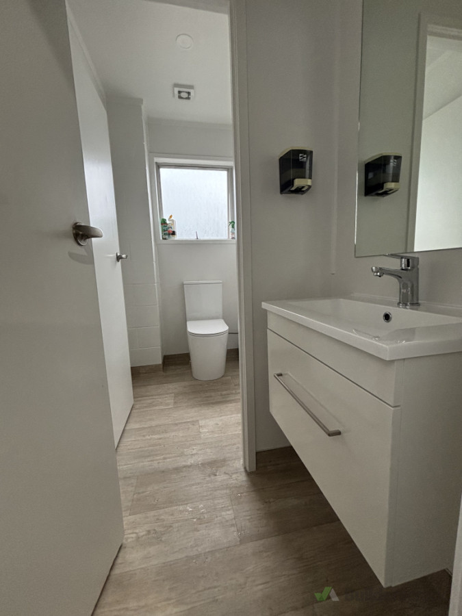 Small bathroom renovation in commercial building