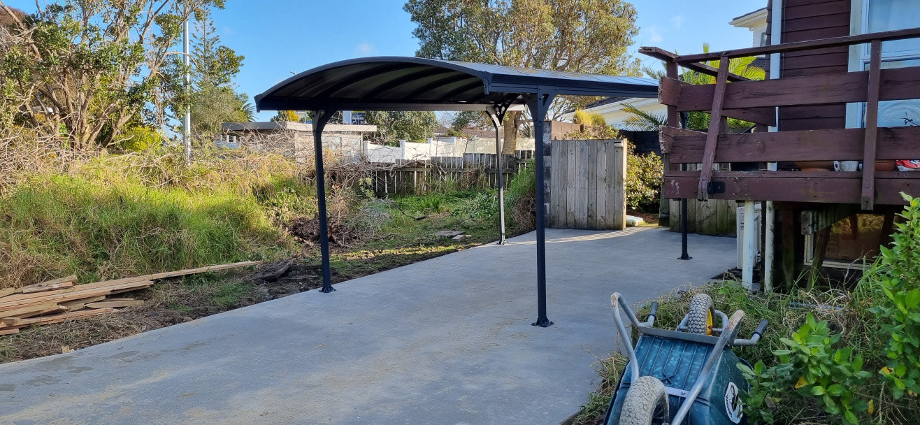 Concrete slab & carport installed.