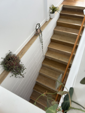 new stairwell with reclaimed Tawa flooring