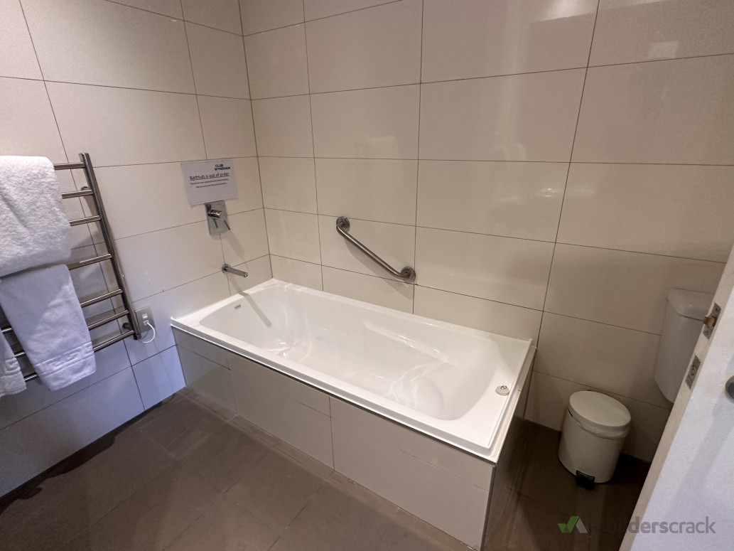 Fixed new bath and tiles around the edge.