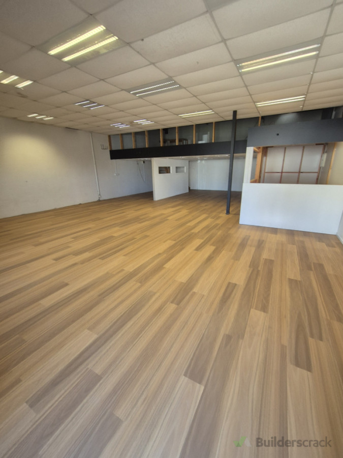 120 metre square luxury vinyl tile installation. Completed in 5 days of hard work, including removing existing laminate flooring, grinding of concrete subfloor, and feather finish coating.