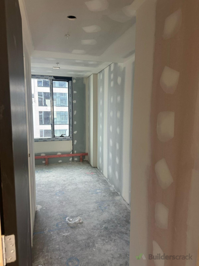 Residential building: interior plastering level 4 finish