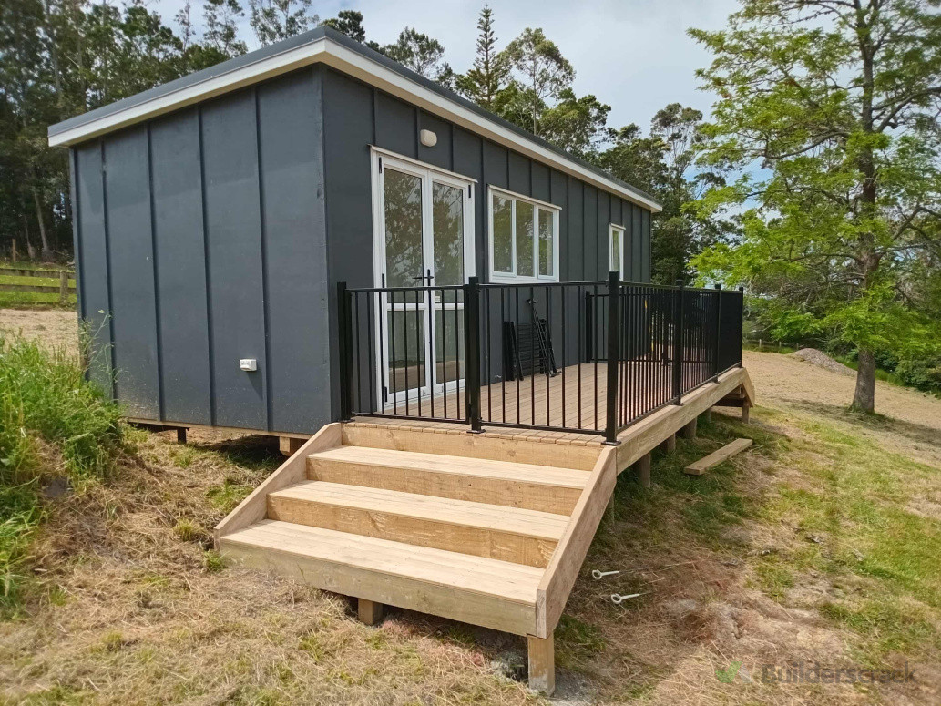 Pine deck with handrail and stairs