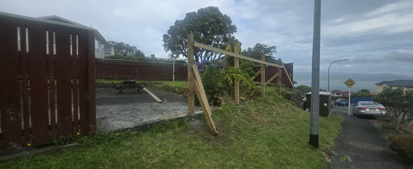 Before: Timber boundary fence repair.