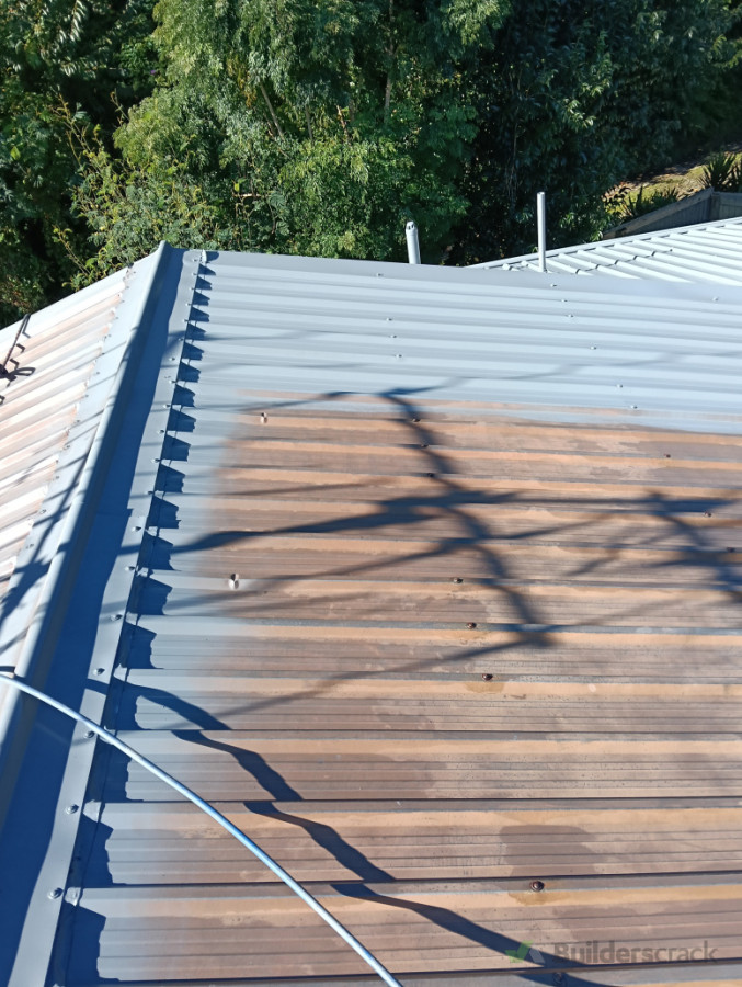 Metal roof restoration and repainting