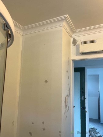 Protruding hall cupboard