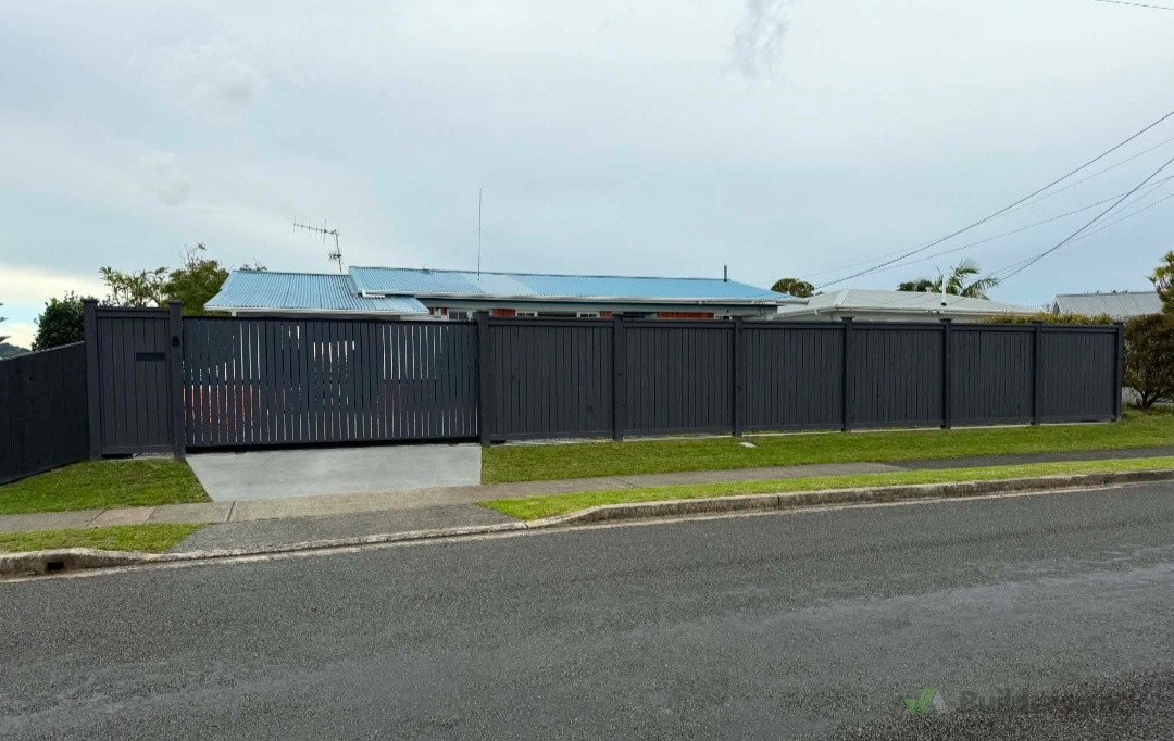 Exposed post & paling fence with custom gate