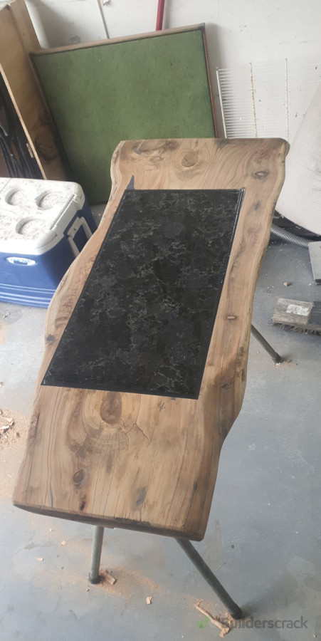 Recessed granite into macrocarpa
