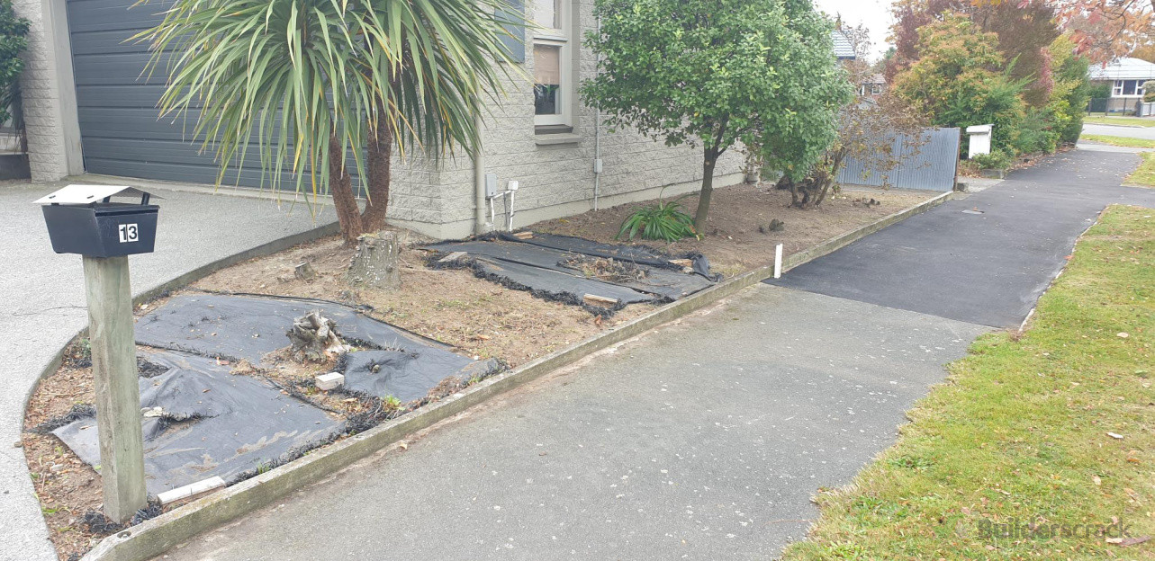 During.. Weeds Removed, Bushes Trimmed