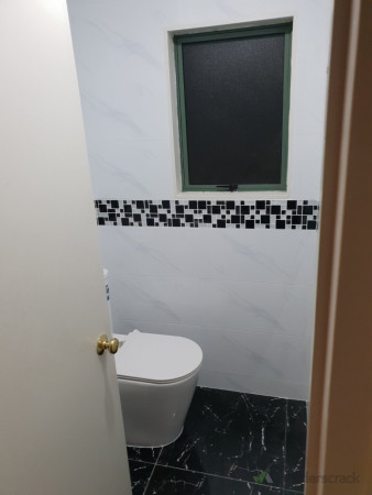 Water Closet with tile finish.