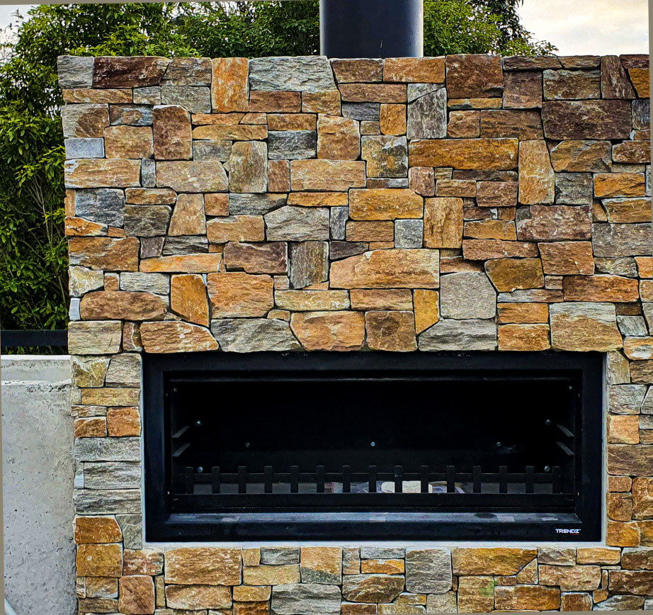 Outdoor fireplace installation and cladding