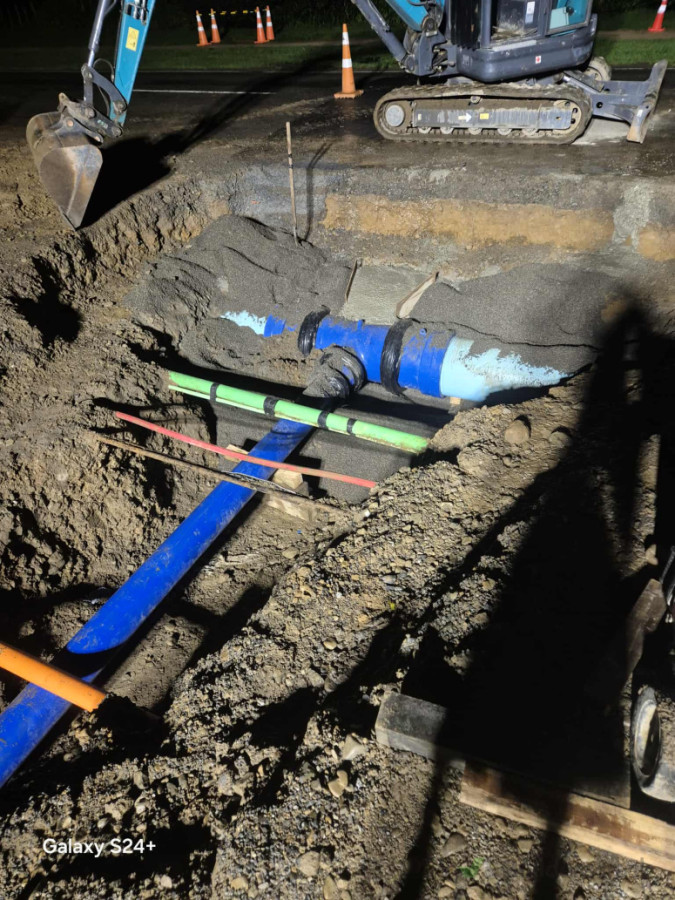 Installed water main Tee section for subdivision