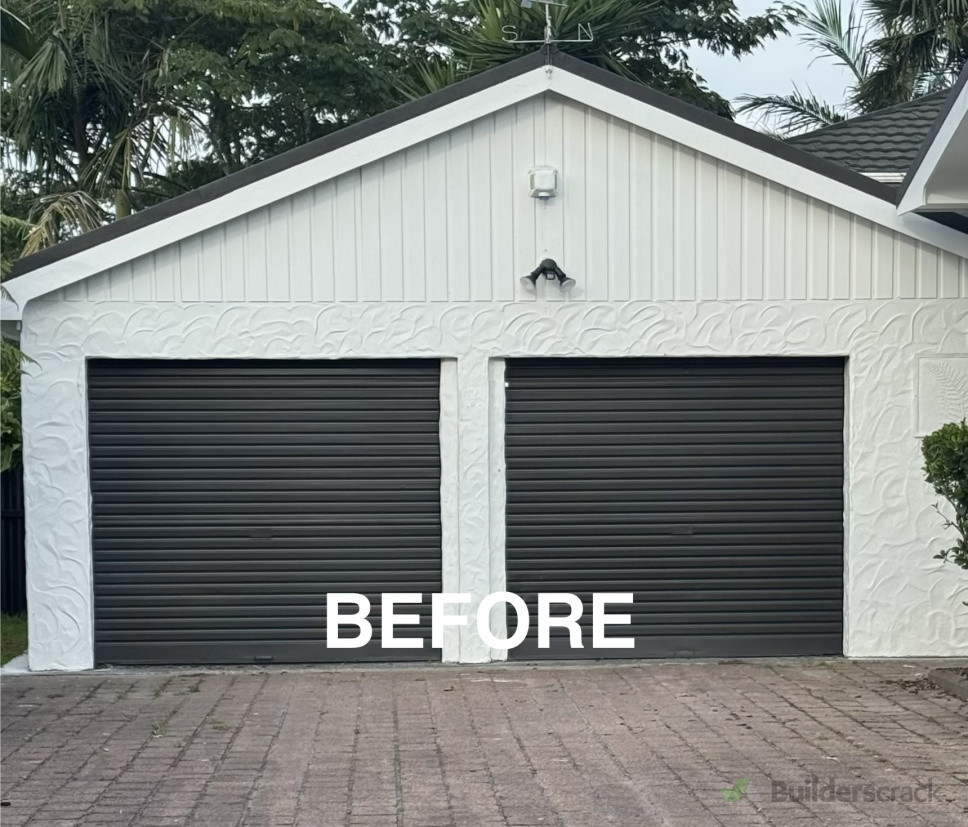 Garage door before and client want to change with sliding door