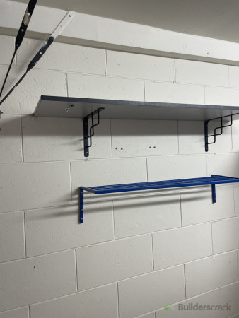Putting up extra shelves.