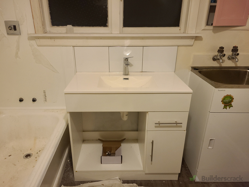 instal vanity and wash tub