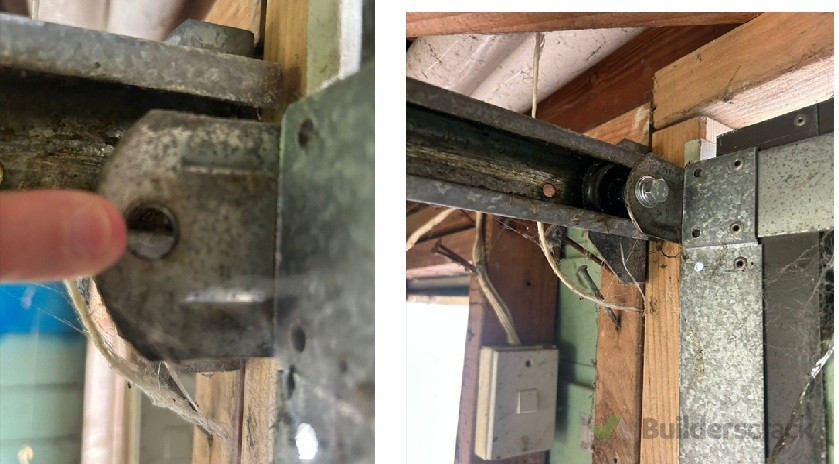 Warn out garage door runners-Machined and Installed new runners for a fraction of the price of a store bought item.