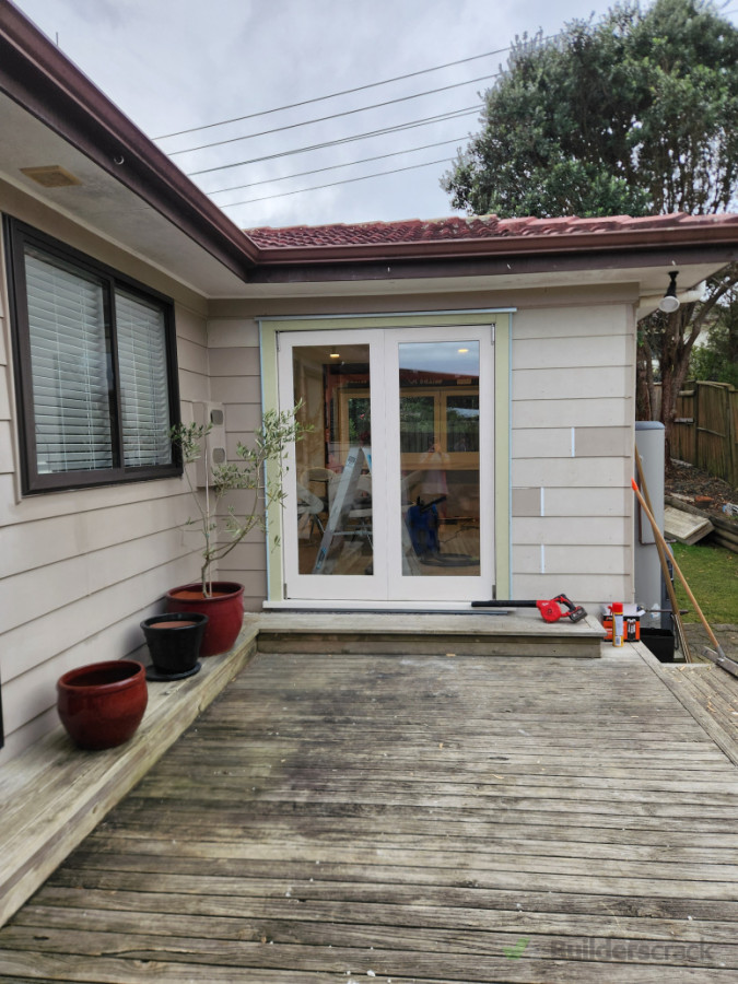 Removed existing aluminium ranch slider,altered framing and cladding and replaced with  beautiful new timber bifold from fineline joinery