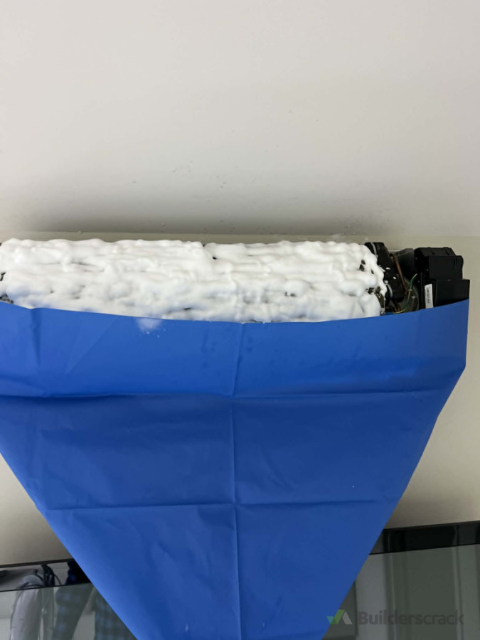 "A/C coil deep-cleaning: Before the rinse."